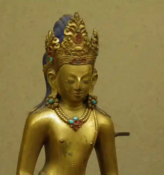 Cross necklace on a statuette, National Museum of Nepal
